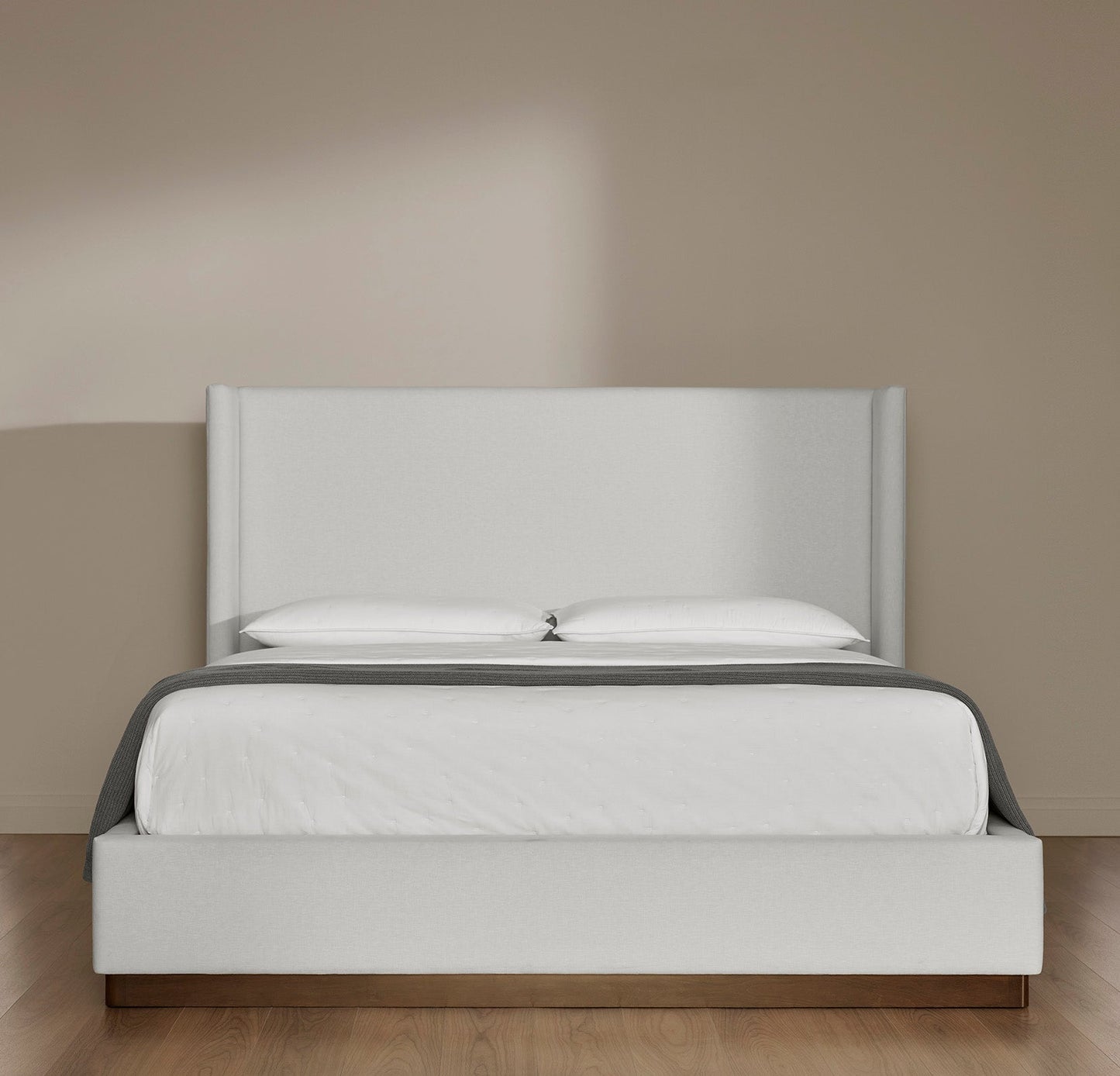Upholstered Wingback Bed